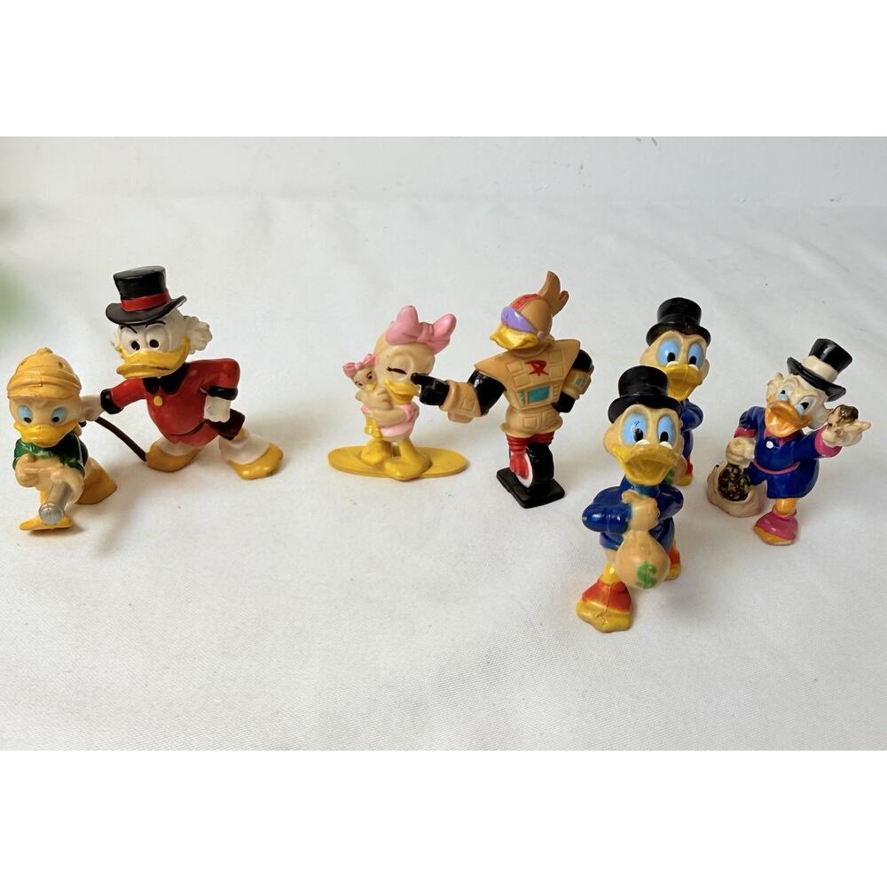1991 Kelloggs Plastic Figurine Lot Of 7 Duck Tails